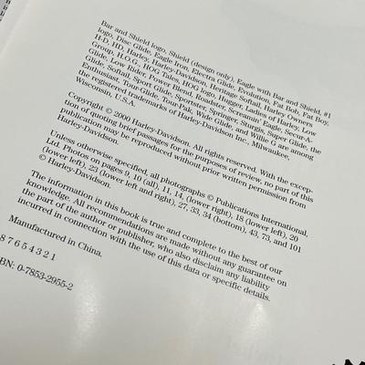 LOT 66: Harley Davidson Items - Storage Bag, History Book, Model Motorcycles