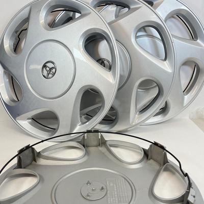 LOT 67: Set of Four Toyota Hub Cups / Wheel Covers - Part # 42621-AA040