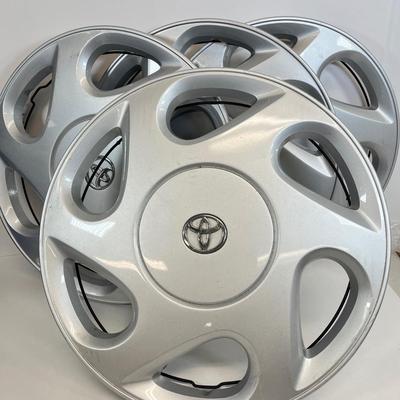 LOT 67: Set of Four Toyota Hub Cups / Wheel Covers - Part # 42621-AA040