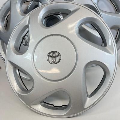 LOT 67: Set of Four Toyota Hub Cups / Wheel Covers - Part # 42621-AA040