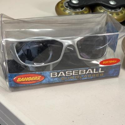 LOT 68: Sporting Goods - Bike Helmets, Baseball Gloves and More