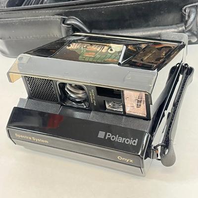 LOT 70: Vintage Camera Equipment, Lenses, Polaroid and More