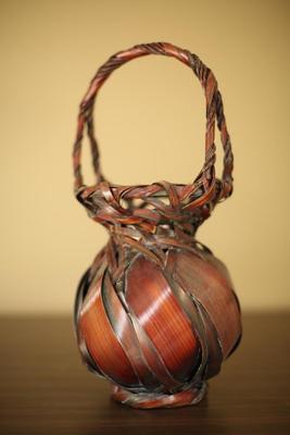Sale Photo Thumbnail #25: Woven rattan and wood vase with handle