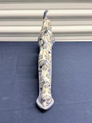 Elephant parade on bridge