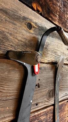 LEFT IS A ANTIQUE HAY KNIFE AND RIGHT ANTIQUE ROOF SLATE TOOL SHINGLE NAIL RIPPER PULLER HAND FORGED IRON CAST TOOL