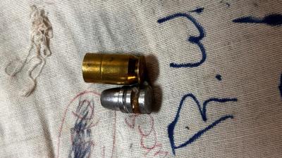 LARGE LOT OF 45 SHELLS AND BULLETS FOR RELOADING