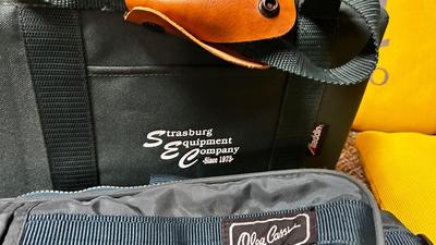 UNIVERSITY OF NORTHERN COLORADO BLEACHER CUSHIONS TRAVEL BAG, ALADDIN SOFT SIDE COOLER AND DRINK DISPENSER