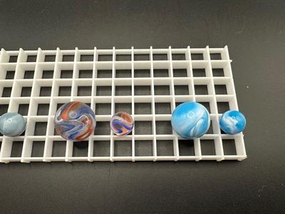 BOULDERS AND MATCHING SMALLER MABLES