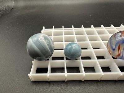 BOULDERS AND MATCHING SMALLER MABLES