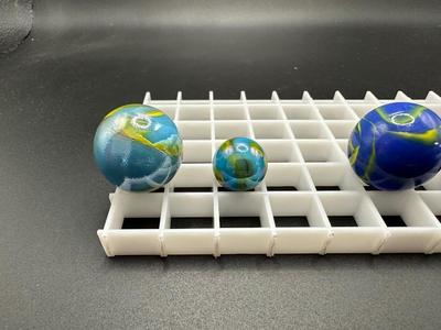 BOULDERS AND MATCHING SMALLER MABLES