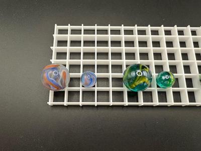 BOULDERS AND MATCHING SMALLER MABLES