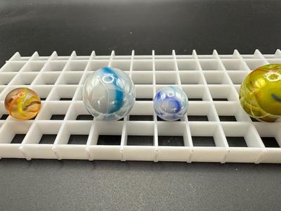 BOULDERS WITH MATCHING SMALLER MARBLES