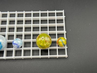 BOULDERS WITH MATCHING SMALLER MARBLES