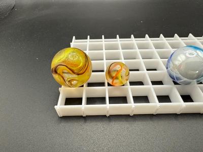 BOULDERS WITH MATCHING SMALLER MARBLES