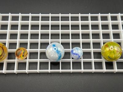 BOULDERS WITH MATCHING SMALLER MARBLES