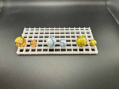 BOULDERS WITH MATCHING SMALLER MARBLES