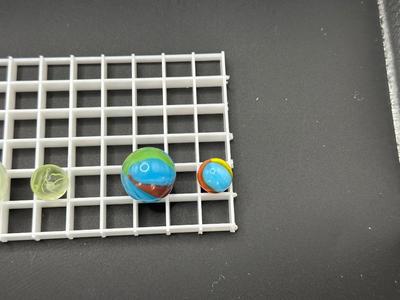 BOULDERS WITH MATCHING SMALLER MARBLES