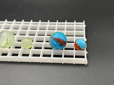 BOULDERS WITH MATCHING SMALLER MARBLES