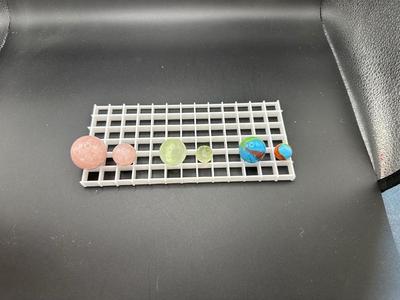 BOULDERS WITH MATCHING SMALLER MARBLES