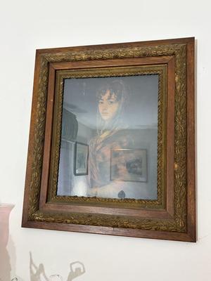 Girl portrait in ornate frame