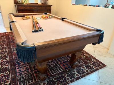 Pool table with sticks & balls