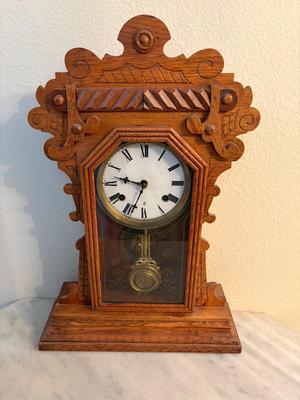 Antique gingerbread parlor clock
