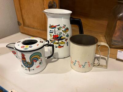 2 enamelware pieces and flour sifter