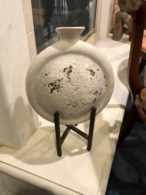Vase on iron stand