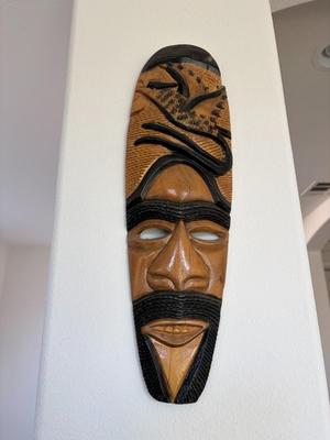 Pair of hand carved African style tribal masks