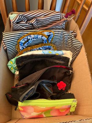 box of makeup bags