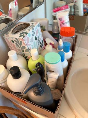 2 boxes cleaning supplies/lotions, etc