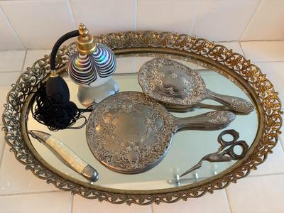 Vanity mirror, perfume bottle, pocketknife, brush and mirror set