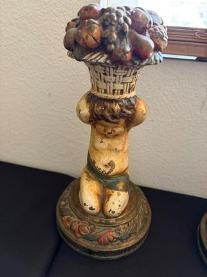 Pair of cherub candleholders