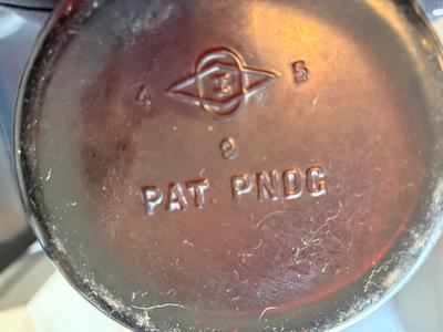 Brown one gallon glass jug