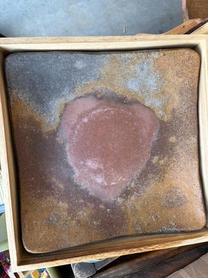 Heavy stone plate in wooden case