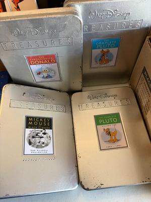 4 tin Disney boxes only