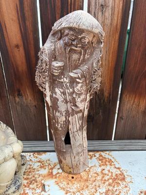 Vintage old man statue