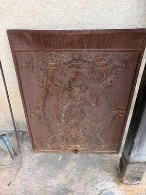 Cast iron fireplace cover