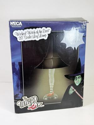 LOT 37: Wizard of Oz Wicket Witch of the East Leg Lamp w/ Box (works!)