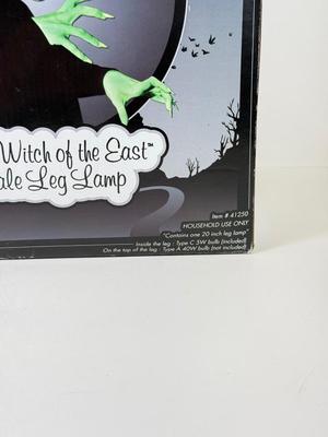 LOT 37: Wizard of Oz Wicket Witch of the East Leg Lamp w/ Box (works!)