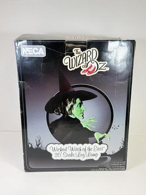 LOT 37: Wizard of Oz Wicket Witch of the East Leg Lamp w/ Box (works!)