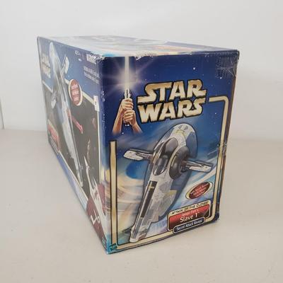 LOT 42: Star Wars Attack of the Clones Jango Fett's Slave 1 Secret Attack Reveal Vehicle