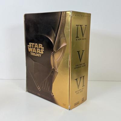 LOT 64: Star Wars Special Edition Original Trilogy on VHS & DVD, Disney World Star Wars Weekends Hats, Boba Fett & Chewie Mugs