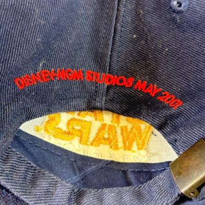 LOT 64: Star Wars Special Edition Original Trilogy on VHS & DVD, Disney World Star Wars Weekends Hats, Boba Fett & Chewie Mugs