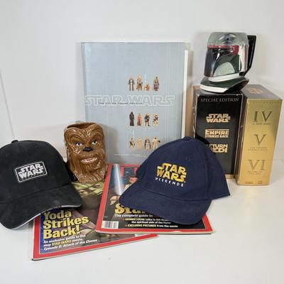 LOT 64: Star Wars Special Edition Original Trilogy on VHS & DVD, Disney World Star Wars Weekends Hats, Boba Fett & Chewie Mugs