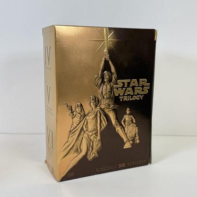 LOT 64: Star Wars Special Edition Original Trilogy on VHS & DVD, Disney World Star Wars Weekends Hats, Boba Fett & Chewie Mugs