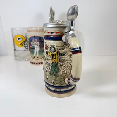 LOT 65: Sports Memorabilia Collection: Slim Jim Glass Mugs, Avon Stein, Riddell Mini Helmets & More
