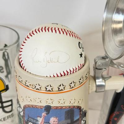 LOT 65: Sports Memorabilia Collection: Slim Jim Glass Mugs, Avon Stein, Riddell Mini Helmets & More