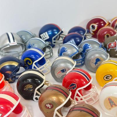 LOT 65: Sports Memorabilia Collection: Slim Jim Glass Mugs, Avon Stein, Riddell Mini Helmets & More