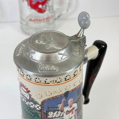 LOT 65: Sports Memorabilia Collection: Slim Jim Glass Mugs, Avon Stein, Riddell Mini Helmets & More